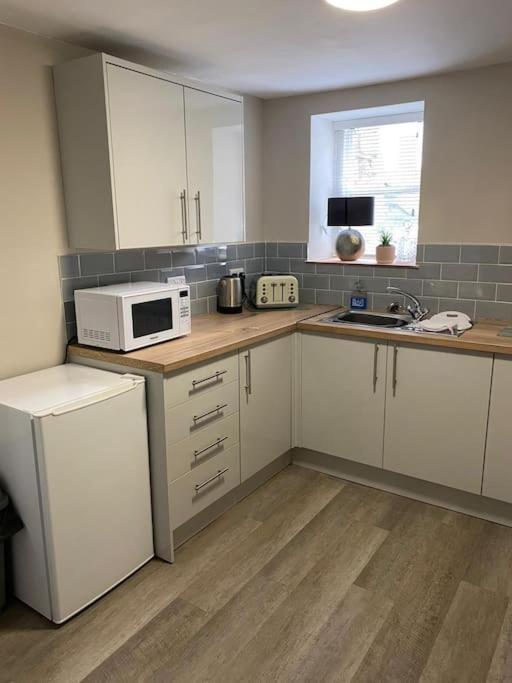 Apartamento Siop Iwan A Menna Caernarfon Exterior foto